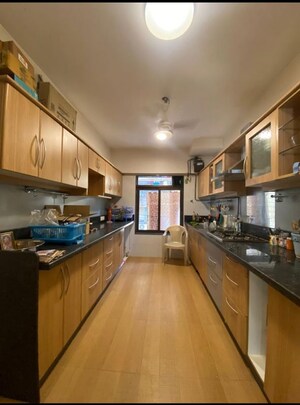 Kitchen in 2.5 BHK Apartment at Athena CHS, Malad West – for Sale