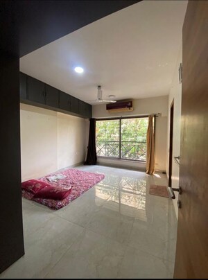 Bedroom in 2.5 BHK Apartment at Athena CHS, Malad West – for Sale