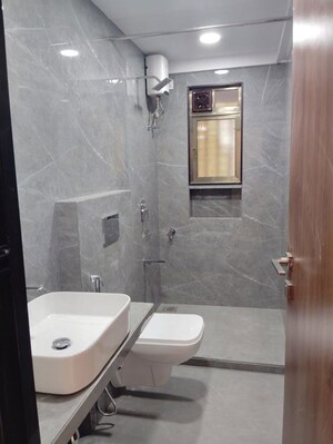 Bathroom in 2 BHK Apartment at Radhe Niwas CHS, Khar West – for Rent