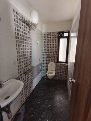 Bathroom in 1 BHK Apartment at Tanvi Eminence I, Mira Road – for Rent