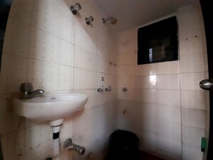 Bathroom in 1 BHK Apartment at Gokuldham Complex, Goregaon East – for Rent