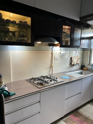 Kitchen in 2 BHK Apartment at Gera Park View, Kharadi – for Rent
