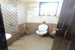 Bathroom in 1 BHK Apartment at Mantri Market, Hadapsar – for Rent