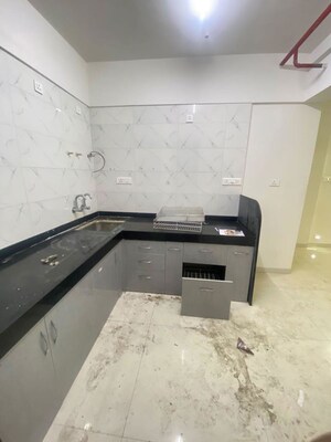 Kitchen in 2 BHK Apartment at Bhaktamar Residency, Wadgaon Sheri – for Sale
