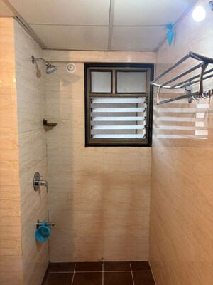 Bathroom in 2 BHK Apartment at Paranjape Blue Ridge, Hinjewadi – for Rent