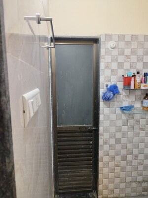 Bathroom in 1 BHK Apartment at Laxmi Park Phase 1 B Wing, Vartak Nagar – for Rent
