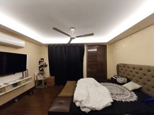Bedroom in 4 BHK Builder Floor at Sushant Lok I – for Rent