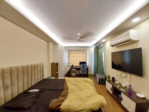 Bedroom in 4 BHK Builder Floor at Sushant Lok I – for Rent