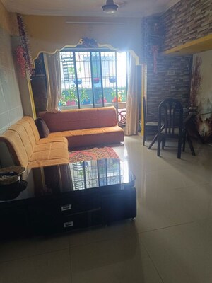 Living Room in 2 BHK Apartment at Ekta CHS, Thane West – for Sale