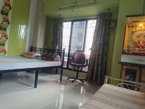 Living Room in 2 BHK Apartment at Ekta CHS, Thane West – for Sale