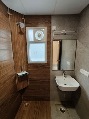 Bathroom in Studio Apartment at Purvanchal Royal City, Chi V Greater Noida – for Sale