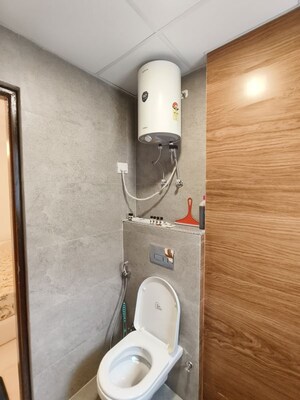 Bathroom in Studio Apartment at Purvanchal Royal City, Chi V Greater Noida – for Sale