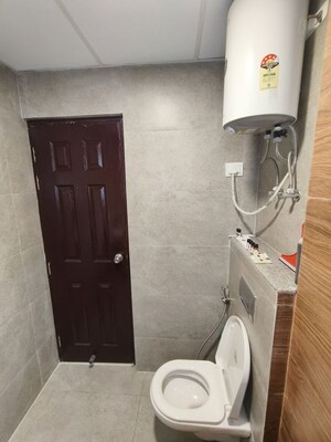Bathroom in Studio Apartment at Purvanchal Royal City, Chi V Greater Noida – for Sale