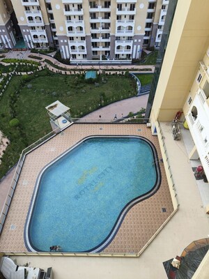 Swimming Pool in Studio Apartment at Purvanchal Royal City, Chi V Greater Noida – for Rent