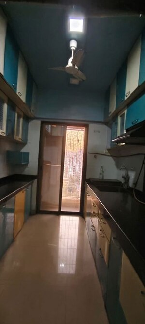 Kitchen in 2 BHK Apartment at Madhav Palacia, Ghodbunder Road – for Sale