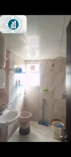 Bathroom in 3 BHK Apartment at Raj Nagar Extension – for Sale