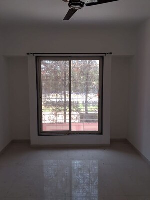 Room in 2 BHK Apartment at Aaiji Pink City, Lohgaon – for Rent