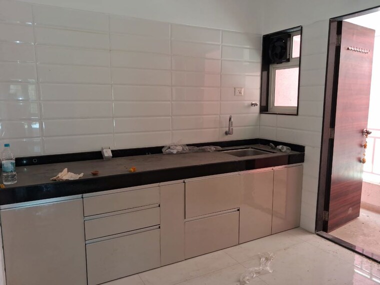 Kitchen, aaiji-pink-city 2 Bedroom 1100 Sq.Ft. Apartment In Lohgaon Pune 10417325