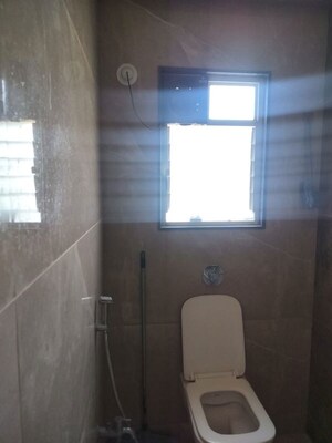 Bathroom in 1 BHK Apartment at Mhada Colony – for Rent