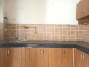 Kitchen in 2 BHK Apartment at Mahagun My Woods, Sector 16c Greater Noida – for Rent