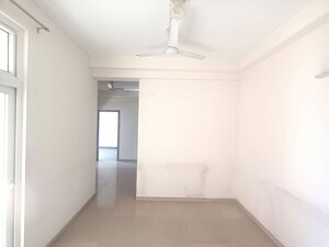 Room in 2 BHK Apartment at Mahagun My Woods, Sector 16c Greater Noida – for Rent