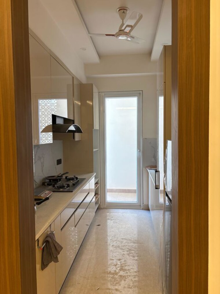 Kitchen, raj-one-good-earth 3 Bedroom 1704 Sq.Ft. Builder Floor In Sector 71 Gurgaon 10417487