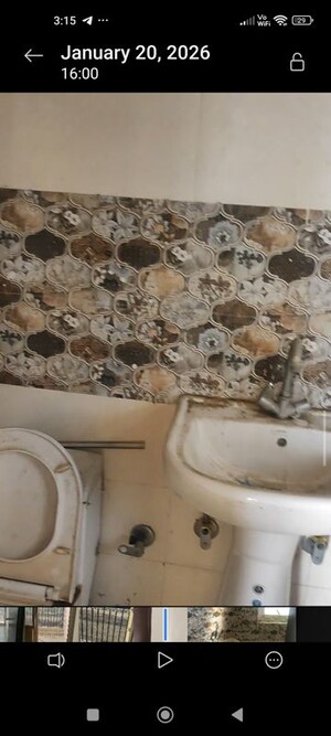 Bathroom in 1 BHK Apartment at Raj Nagar Extension – for Sale
