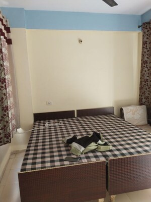 Bedroom in 1 BHK Apartment at Auric City Homes, Sector 82 – for Rent