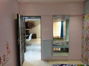 Room in 2 BHK Apartment at Lokhandwala Whispering Palms, Kandivali East – for Rent