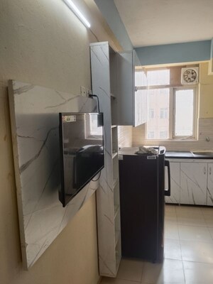 Kitchen in 1 BHK Apartment at Auric City Homes, Sector 82 – for Rent