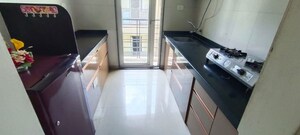Kitchen in 1.5 BHK Apartment at Dheeraj Jade Residences, Wagholi – for Rent