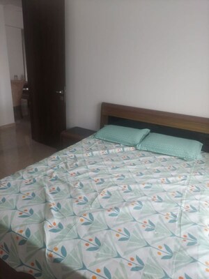 Bedroom in 2 BHK Apartment at Satellite Garden, Goregaon East – for Rent