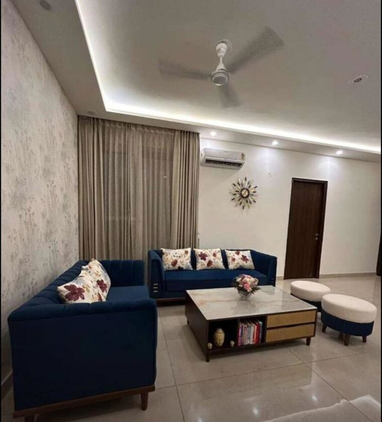 Living Room, maya-green-lotus-saksham 3 Bedroom 1906 Sq.Ft. Apartment In International Airport Road Zirakpur 10417994