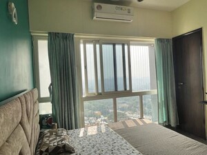 Bedroom in 2 BHK Apartment at Omkar Ananta, Goregaon East – for Rent