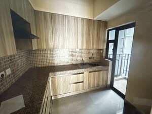 Kitchen in 2 BHK Apartment at Paras Dews, Sector 106 – for Rent
