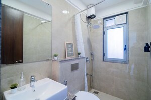 Bathroom in 3 BHK Apartment at Sunteck City Avenue 4, Goregaon West – for Sale