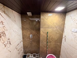 Bathroom in 1 BHK Apartment at Royal Palms Garden View, Goregaon East – for Rent