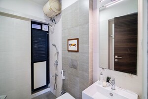 Bathroom in 2 BHK Apartment at Kanakia Rainforest, Andheri East – for Sale