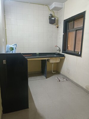 Kitchen in 1 BHK Apartment at Amrut Aangan, Kalwa – for Rent