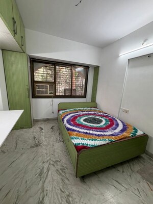 Bedroom in 2 BHK Apartment at Kukreja Complex, Bhandup West – for Sale