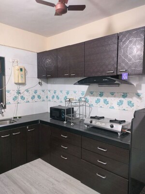 Kitchen in 2 BHK Apartment at Brindaban Mathura CHS, Vrindavan Society – for Sale