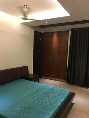 Bedroom in 4 BHK Builder Floor at Nehru Enclave – for Rent