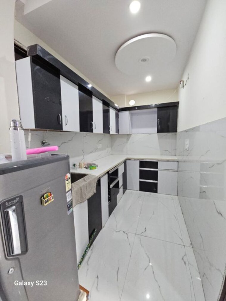 Kitchen, west patel nagar 2 Bedroom 100 Sq.Ft. Builder Floor In West Patel Nagar Delhi 10418397