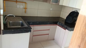 Kitchen in 2 BHK Apartment at Tata Eureka Park, Sector 150 – for Rent