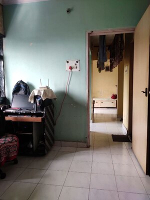Living Room in 2 BHK Apartment at Kamothe Sector 19 – for Sale