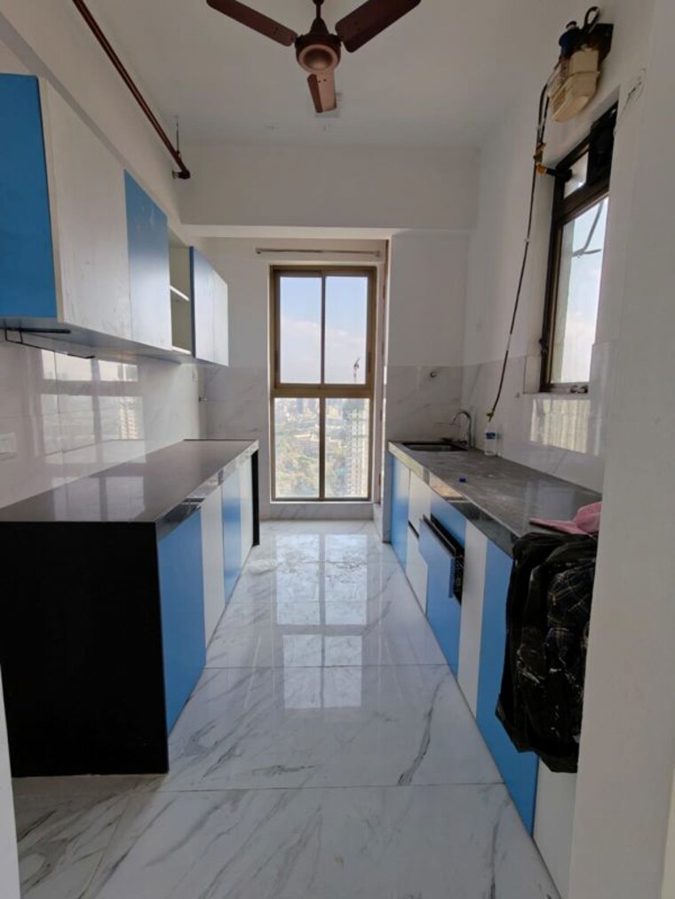 Kitchen, raymond-realty-phase-ii 2 Bedroom 640 Sq.Ft. Apartment In Pokhran Road No Two Thane 10418465