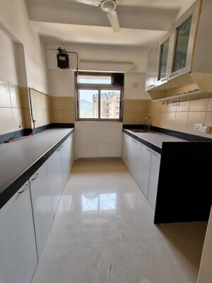Kitchen in 3 BHK Apartment at Lodha Splendora, Ghodbunder Road – for Sale