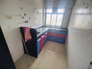 Kitchen in 1.5 BHK Apartment at Malad West – for Rent