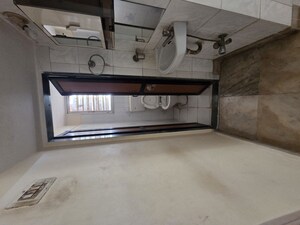 Kitchen in 2 BHK Apartment at Cosmos Habitat, Majiwada – for Rent
