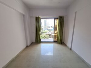 Room in 2 BHK Apartment at Kandivali West – for Rent